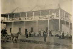 Mining-Office-Newman-in-White-shirt-center-c_1900